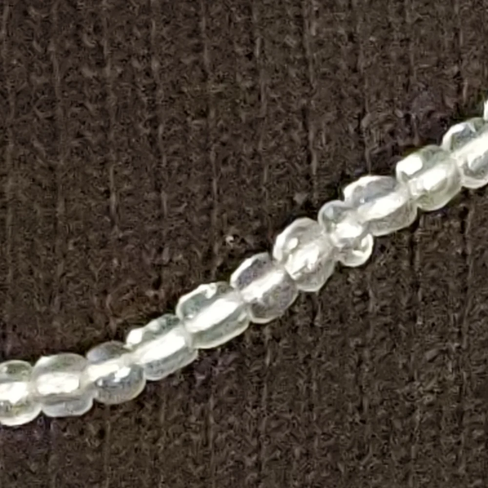 Clear iridescent beaded stretch necklace 14 inches long unstretched